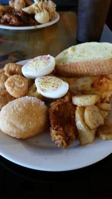 Corn nuggets, butter potatoes,  pizza, garlic bread,  chicken, doughnut