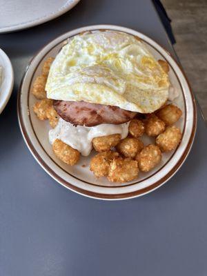 Breakfast Horseshoe with ham, tater tots, and eggs over easy