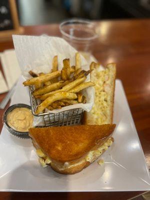 Grilled cheese with shrimp Mac and cheese.