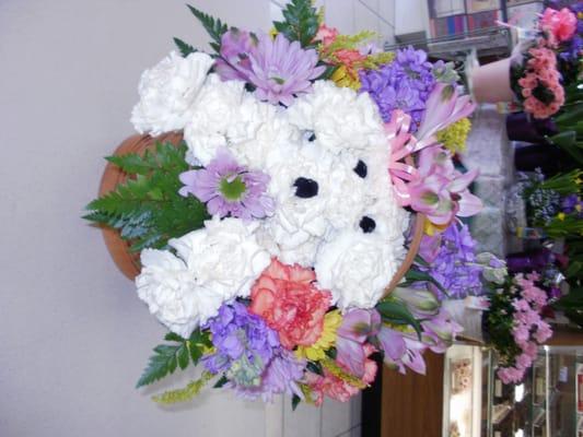 Send a flower arrangement with her favorite dog