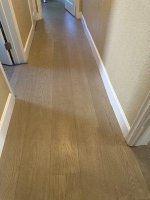 Portofino White Oak Engineered Hardwood Flooring in the color Rembrandt.  Comes with a lifetime Residential Home Warranty.