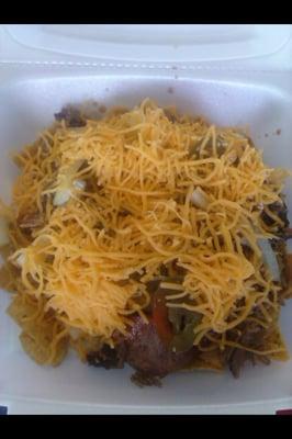 Loaded gun!!! Fritos with baked beans, brisket, sausage, jalapeños, onions, cheese, and BBQ sauce!!!