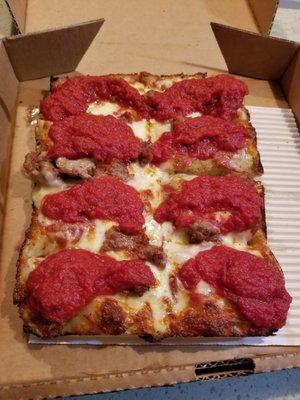 Single Detroit with pepperoni and sausage.