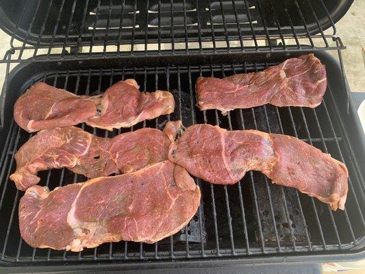 Marinated shoulder meat ($5.99/lb) ok; flap meat is better