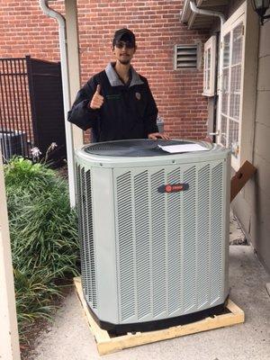 Trane AC outdoor unit being installed at a commercial location