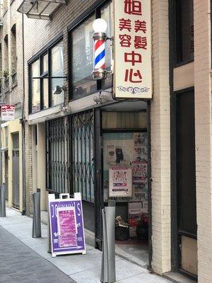 Exterior of Johnny’s Hair Studio in San Francisco's Chinatown.