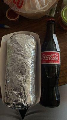 Carne asada burrito and a Mexican coke. Size reference, big sized burritos!!