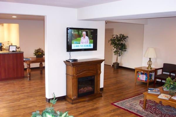 Stay and warm yourself by the fireplace or watch your favorite show on the 40" flat screen while we service your car!