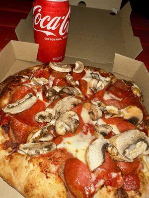 Personal pizza, pepperoni, and mushrooms.