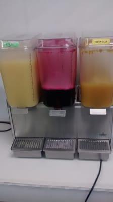 Cashew, gooseberry and passion fruit beverages at the lunch buffet (food sold by pound)