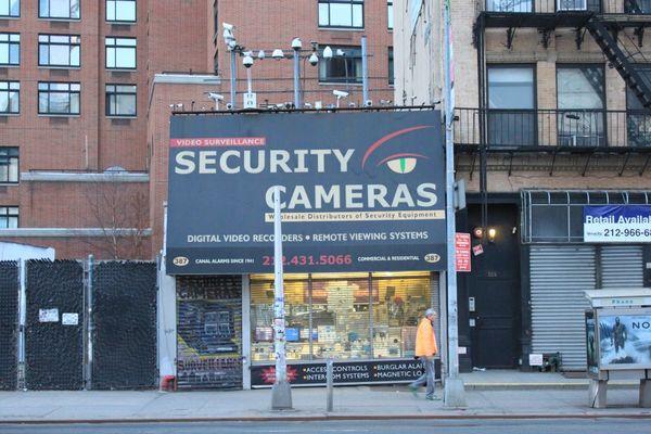 Outdoor view of Canal Alarm Devices, Inc. from across Canal Street.