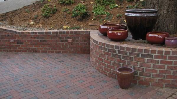 Outdoor brick patio and retaining wall