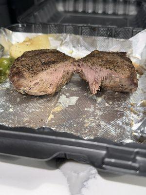 A steak that was supposed to be cooked medium rare. This was the second attempt.