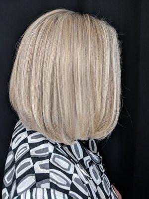 Classic haircuts are always in style. This girls adds some highlights and lowlights to blend grey and give her hair dimension.