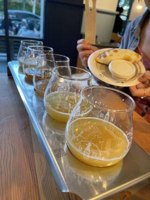 Flight of beers + empanada