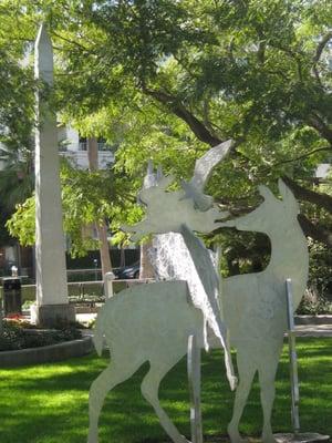 1992. Joe Fay's aluminum sculptures "Obelisk" & "Tracinda Meadow Deer".