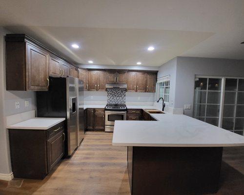 soild maple wood cabinets and overhump quartz countertop