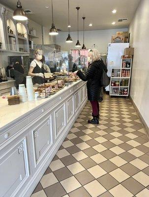 French bakery with custom cabinetry with elaborate trims built 100% on site.