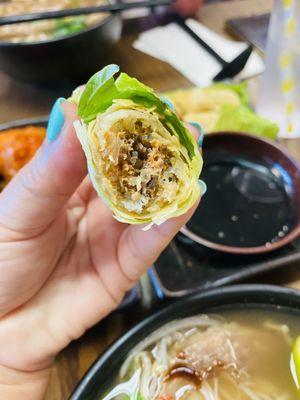 Inside of the Vietnamese spring roll- ground pork, wood ear mushrooms, mung bean noodles, carrots. Delicious.