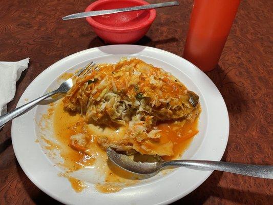 Delicious revuelta with cabbage and tomato sauce.