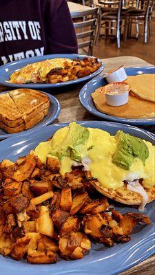 Short stack of pancakes, Mexican eggs Benedict and jalapeño popper omelette