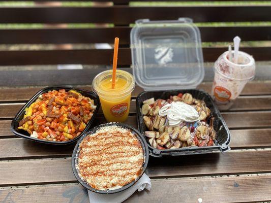 Left to right: Tostilokos, mango smoothie, Corn In A Cup, mini pancakes, fresas con Strawberries N' Cream.