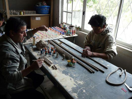 Craftsmen making clay figures near Cuenca Ecuador