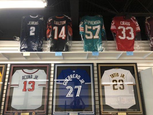 Framed and unframed autographed jerseys