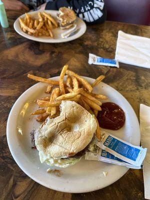 Two burgers and what's supposed to be Cajun fries.