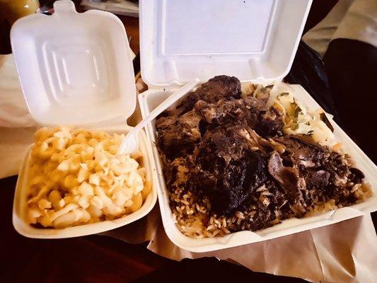 Large Succulent and Tender Jerk Chicken, Fluffy Rice and Red Beans, Festive Cabbage & Side Order of Tasty Mac & Cheese