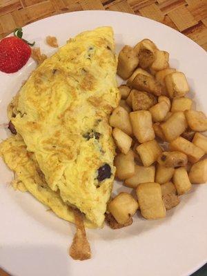 Make your own omelet with 3 ingredients (75 cents more for each additional topping), side of home fries. $6.50