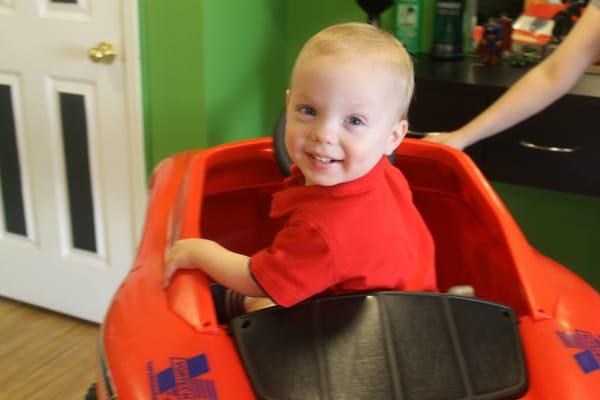 Enjoying his fun-packed haircut!