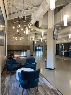 Seating area inside of a church, Joyhouse coffee is inside of a church building