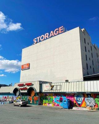 Public Storage above; Lucky Penny (defunct) below. I took this photo mostly for the murals.