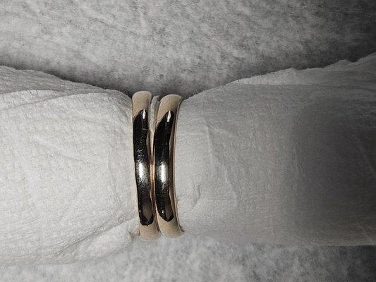 Wedding band and repaired engagement ring band