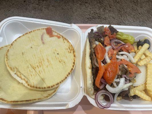 Super supreme comes with 3 pitas plenty of meat the take away box is packed here