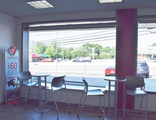 High Top Customer Computer Tables Looking Out Window in Waiting Area