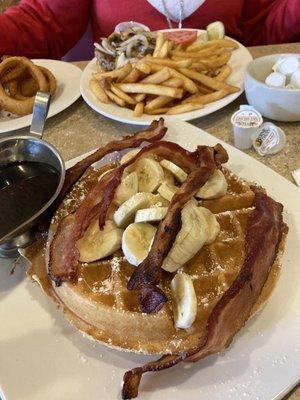 Waffle with banana and bacon. Turkey burger with the works and fries.