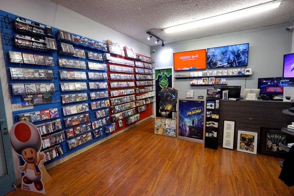 Wide selection of new and used games on the wall