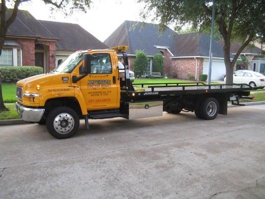 We offer Flatbed Towing