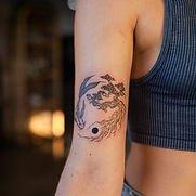 ying yang fine line tattoo