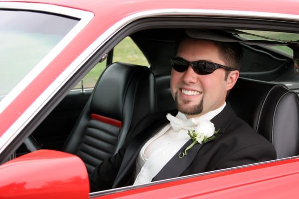 Jamin driving his mustang which Atlas helped restore