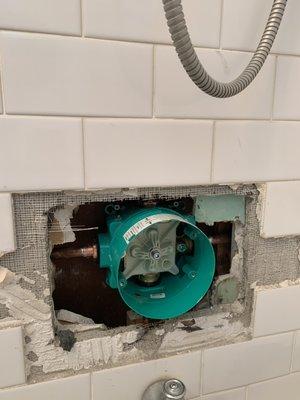 Old shower valve out and new one going in.