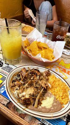 Pollo ala crema added rice and beans and a large house margarita