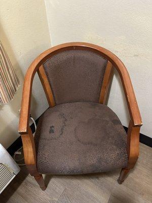 Filthy chair with unwashable stains.