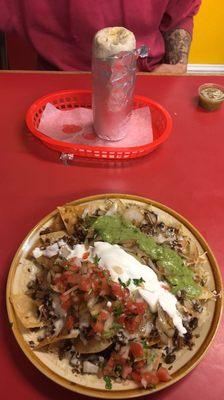 Carne Asada Super Nachos with grilled onions