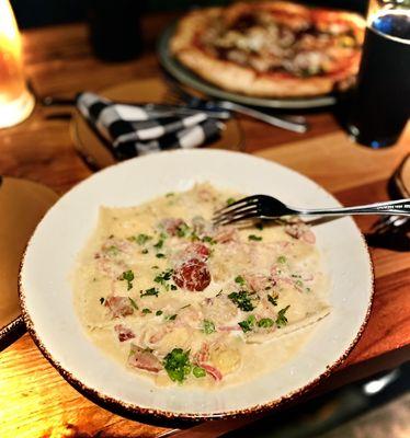 LEMON RICOTTA RAVIOLI 21 English pea + pancetta + shallot + garlic butter + roasted tomato + white wine + parmigiano