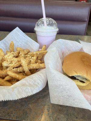 Garlic fries, mushroom burger and strawberry shake.