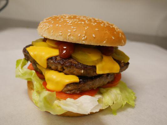 Our Super Cheeseburger! One whole pound of mouthwatering delight.