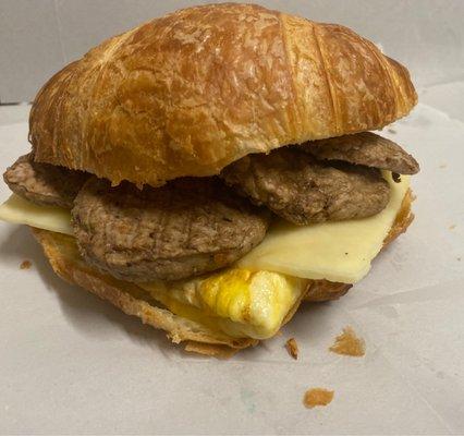 Sausage egg and cheese on croissant